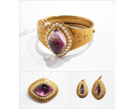 Victorian suite of seedpearl and amethyst-coloured jewellery to include bangle, brooch and pendant, each of lozenge-shape sur