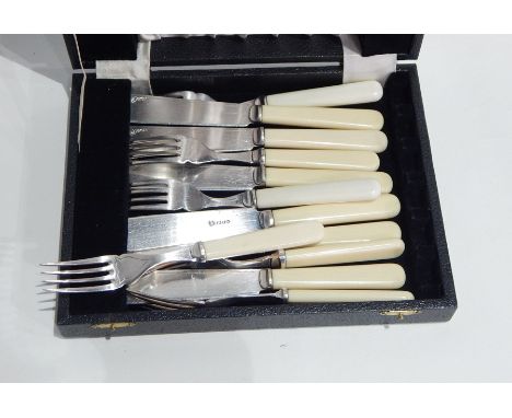 Quantity various plated table flatware including soup ladle and fish knives and forks (1 box) 