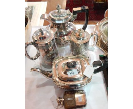 Silver-mounted glass hip flask, silver plated teapot and three hot water jugs 