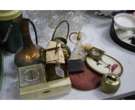 Works of art, to include a ambrotype case, brass magnifying weight, onyx table lighter, needlework picture, brass carriage cl