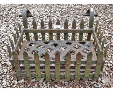 Decorative old iron fire grate 