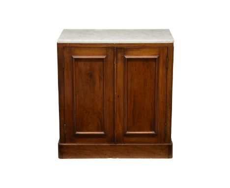 A Victorian marble topped mahogany boot cupboard, the marble top over two single panel cupboard doors on a plinth base, with 