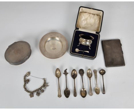 A group of silver smalls, including a silver charm bracelet; a Birks (Canadian) oval engine turned jewellery box , 4 3/8in. (