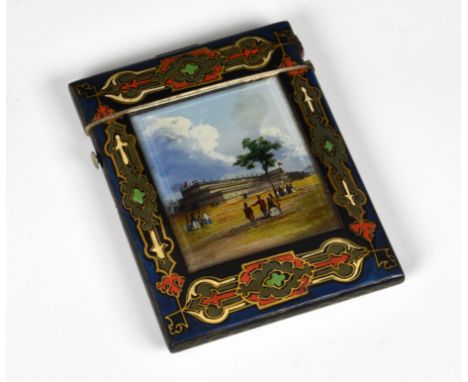 A Victorian papier-mâché souvenir card case, the front panel with bevelled glass cover, printed &amp; painted with image of C