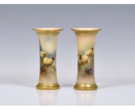 A pair of Royal Worcester porcelain sheep painted trumpet spill vases by Harry Davis, each painted with two sheep in highland