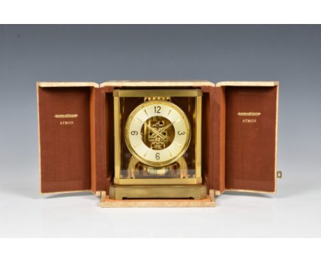 An early model Jaeger Le-Coultre Atmos II Clock, 1950s, with 4¾in. champagne chapter ring with gilt batons and Arabic numeral