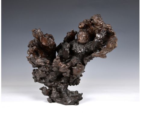 A fine Japanese carved rootwood okimono, probably Meiji period (1868-1912), signed to front of base, depicting a bearded deit