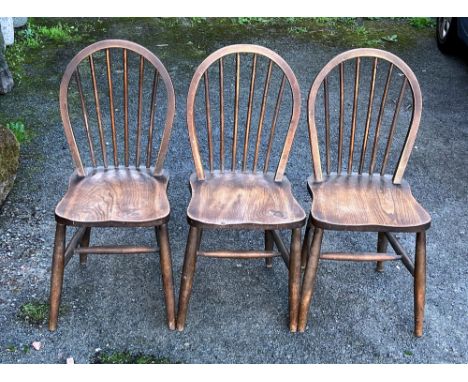 Ercol - Lucian Ercolani -  a set of three mid century Utility beech and elm Windsor dining chairs, 1945-53, the hoop backs wi