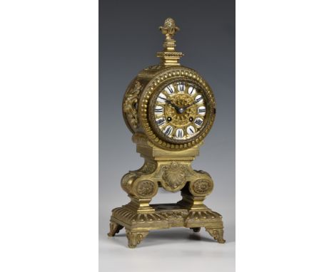 A late 19th century French brass mantel clock, with Japy Freres bell strike movement, no. 21718, retailer's mark for Miller &