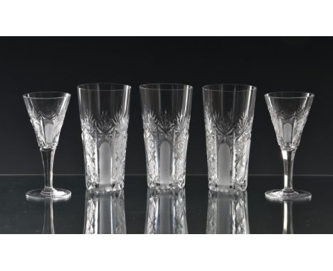 A set of six mid-century cut glass sherry glasses, the drawn, trumpet bowls with blaze, star and hobstar cut and panel etched