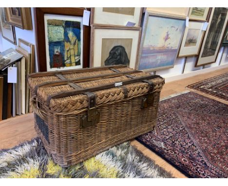 A French, early 20th Century Wicker Hamper, with cotton lining, Enamel plaque ‘Malle Moderne, Brevettee SGDG’, 26½ x 17½ (67.