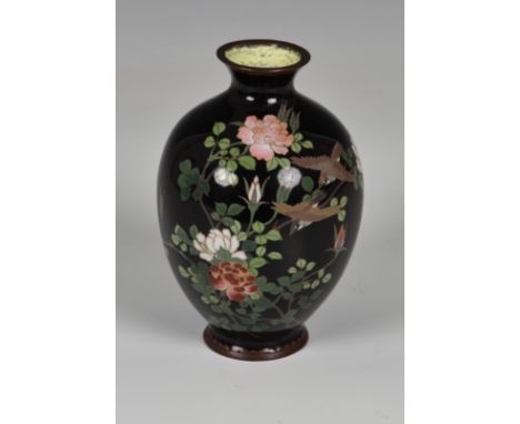 A small silver wired Japanese cloisonné vase, Meiji period (1868-1912), of ovoid form, the black ground decorated in fine sil