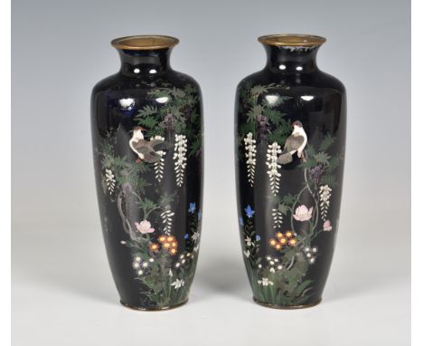 A pair of midnight blue ground Japanese cloisonné enamel vases, Meiji period (1868-1912), of slender, high-shouldered form, w