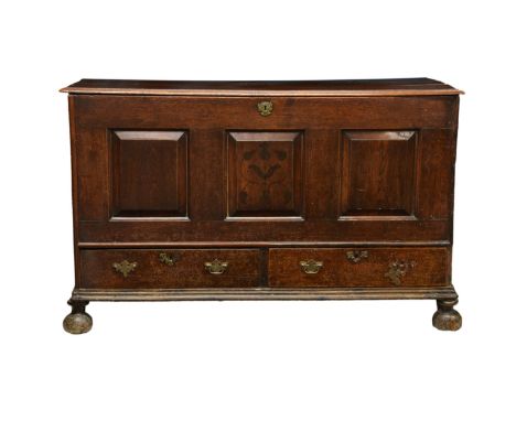 A Georgian oak mule chest - restoration project, The single plank lid over a three panel front with naive vase and flower mot