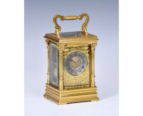 A large French gilt brass carriage clock with repeat, late 19th century, with Corinthian column gorge case, the silvered Arab