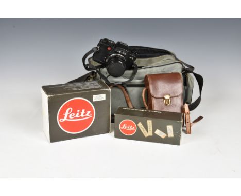 A Leica R5 camera outfit, black, serial no. 1716257, with original box and strap; together with a Leitz Summicron-R f/2 50mm 