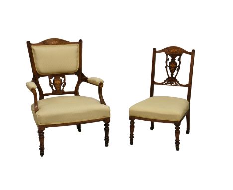 An Edwardian rosewood and marquetry open armchair with matching side chair, the arched top rail over a padded back with pierc