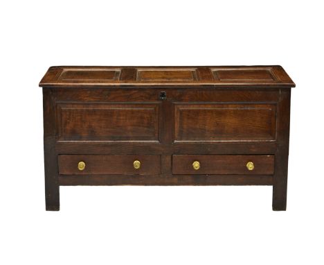 A late 18th / early 19th century joined oak mule chest, the three panelled top over a two panel front with two short draws, r