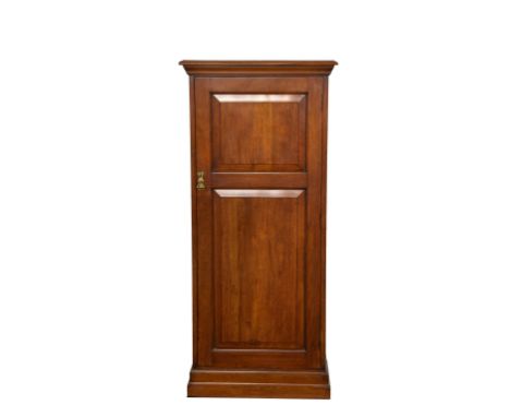 A late 19th / early 20th century mahogany side cabinet, the stepped top over a single two panel door opening to adjustable sh