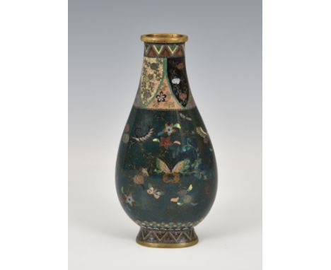 An unusual Japanese cloisonné enamel vase, Meiji period (1868-1912), of flattened pear form, with dark mottled blue-green gro