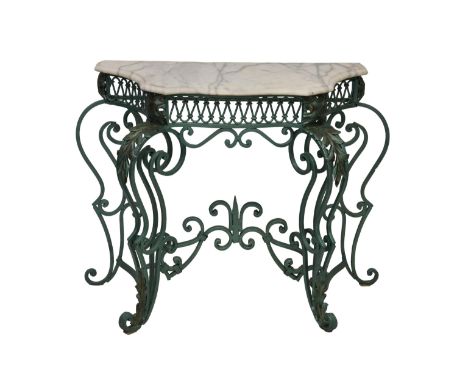 A serpentine wrought iron console table with white marble top, the scrolled base with applied acanthus leaves to the twin sec