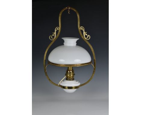 A 19th century style brass ceiling oil lamp, 20th century, fitted for electricity, with white milk glass reservoir and shade,