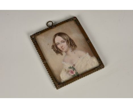 A Continental, mid 19th century, portrait miniature of a young woman, signed "Peter", her hair with ringlets, wearing a white