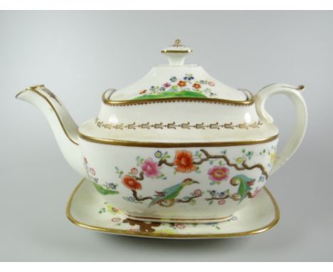 A SWANSEA PORCELAIN TEAPOT &amp; STAND, the teapot of rounded rectangular form with spurred loop handle and mushroom finial, 