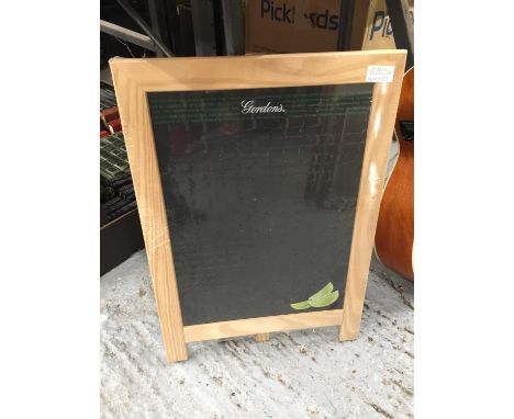 A 'GORDON'S' GIN BLACKBOARD ON A STAND 39CM X 56CM 