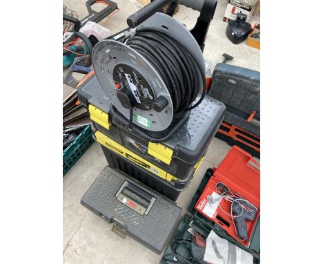 A STANLEY STACKING TOOLBOX TROLLEY, A FURTHER TOOL BOX, SOME TOOLS AND AN EXTENSTION CABLE 