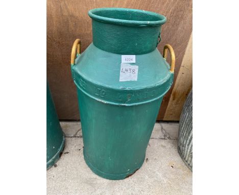 A VINTAGE GREEN PAINTED CAST IRON MILK CHURN (A/F TO BASE) 
