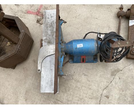 AN ELECTRIC BENCH GRINDER AND WOOD PLANE 