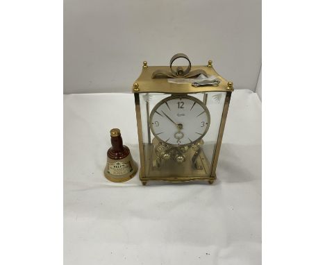 A 'LUNDA' CARRIAGE CLOCK WITH KEY PLUS A MINIATURE BELLS DECANTER 