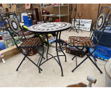 A DECORATIVE BISTRO SET COMPRISING OF A ROUND TABLE WITH TILE TOP AND TWO CHAIRS WITH TILED DETAIL 