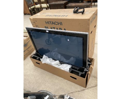 A 42 INCH HITACHI WIDE SCREEN TV COMPLETE WITH BOX 