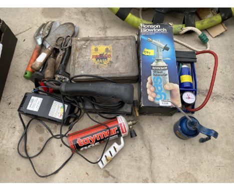 AN ASSORTMENT OF ITEMS TO INCLUDE A FOOT PUMP, AN ELECTRIC SANDER AND A FIRST AID CASE ETC 