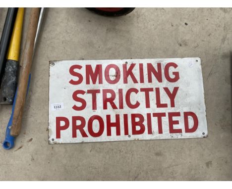 AN ENAMEL 'SMOKING STRICTLY PROHIBITED' SIGN 