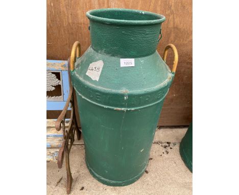 A VINTAGE GREEN PAINTED CAST IRON MILK CHURN (A/F TO BASE) 