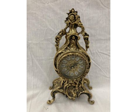 A FRENCH ORNATE HEAVY BRASS MANTLE CLOCK WITH BATTERY MOVEMENT 