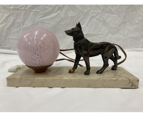 AN ART DECO LAMP WITH AN ALSATION ON A MARBLE BASE 