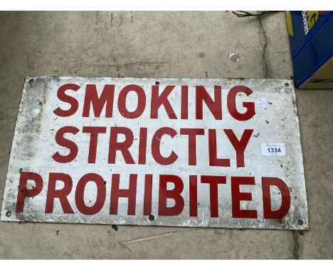AN ENAMEL 'SMOKING STRICTLY PROHIBITED' SIGN 
