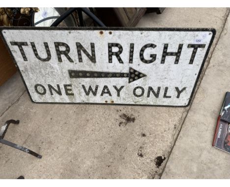 A VINTAGE 'TURN RIGHT ONE WAY ONLY' SIGN
