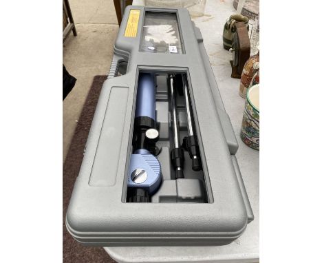 A TELESCOPE WITH TRIPOD STAND 