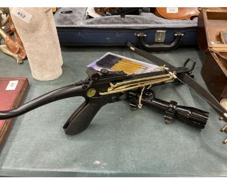 A CROSSBOW WITH 10 BOLTS AND TELESCOPIC SIGHTS 
