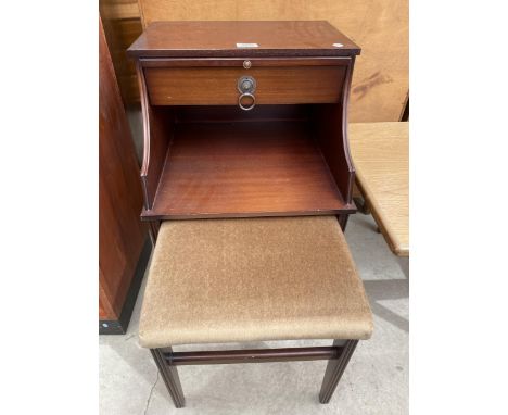 A 'CHIPPY TELEPHONE SEATS' TELEPHONE TABLE WITH PULL-OUT STOOL, SINGLE DRAWER AND SLIDE 