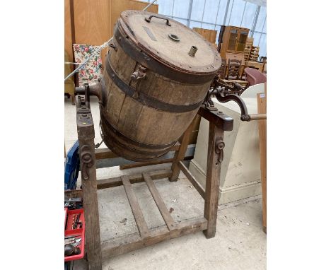 A LARGE VINTAGE OAK BUTTER CHURN WITH STAND 