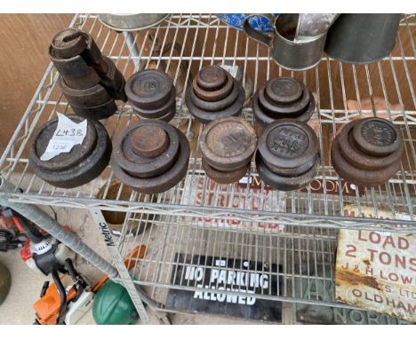A LARGE ASSORTMENT OF VINTAGE CAST IRON WEIGHTS 