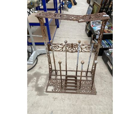 A DECORATIVE STEEL WELLIE STAND 