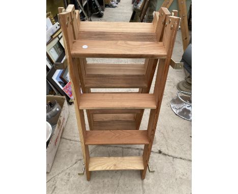 A WOODEN FOLDING LOFT LADDER 