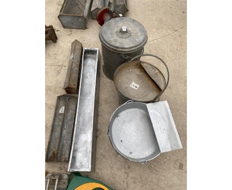 AN ASSORTMENT OF GALVANISED ITEMS TO INCLUDE POULTRY FEEDERS, A TROUGH AND BUCKETS ETC 